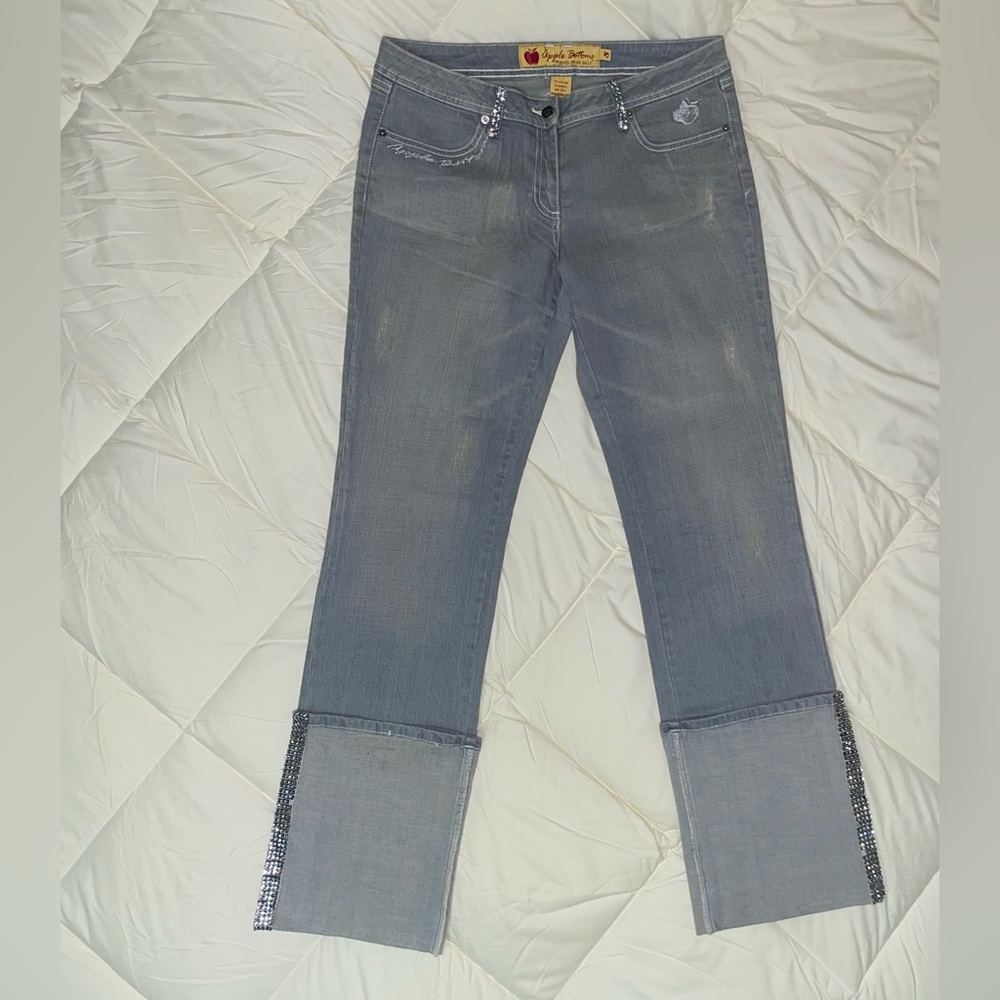 Straight leg apple bottom jeans with gold over cuff design